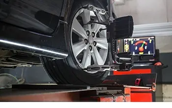 Wheel alignment and wheel rim repair services